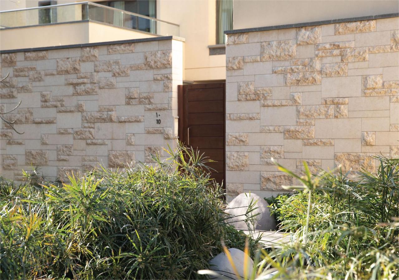 Jumeirah Messilah Beach Hotel&Spa Kuwait Kuwait City Bagian luar foto A house in the village