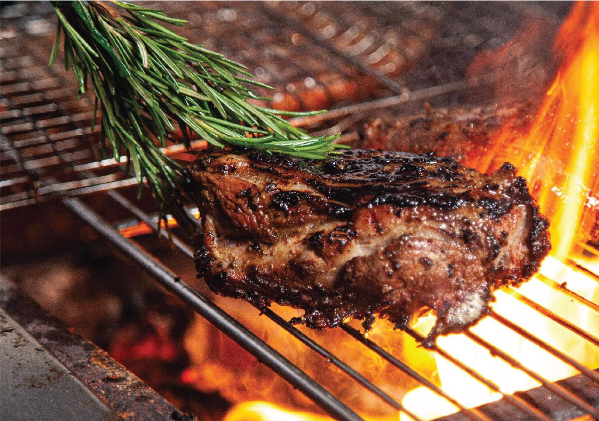 Jumeirah Messilah Beach Hotel&Spa Kuwait Kuwait City Bagian luar foto A steak being grilled